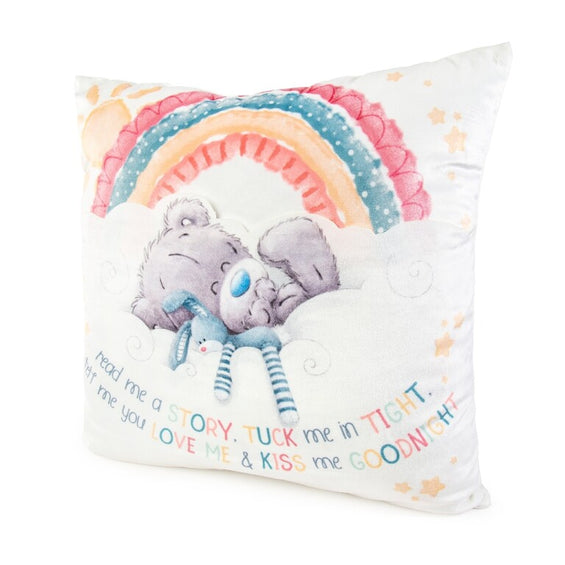 Cushion with a cartoon bear and rainbow design on a white background